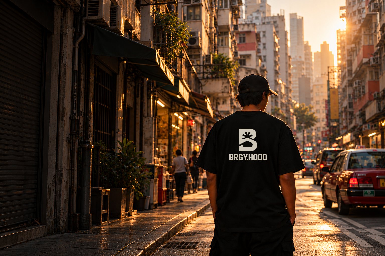 AI-generated campaign scene: a person wearing BRGY.HOOD on a Hong Kong neighborhood street at golden hour.